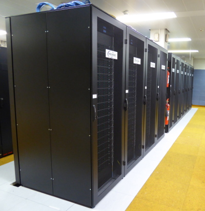 a row of racks full of servers in the serverroom